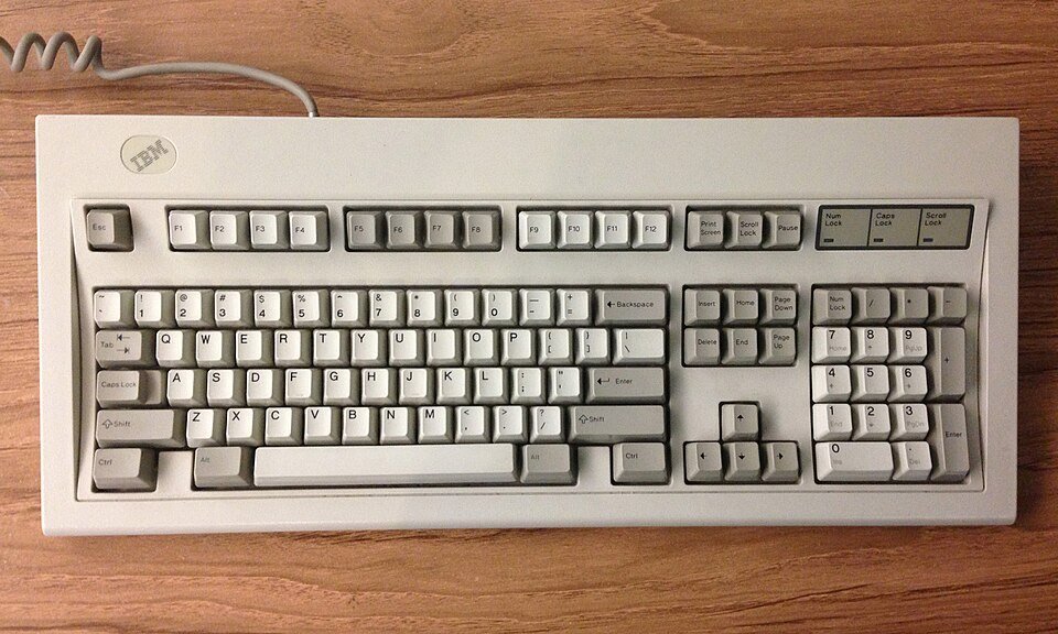 IBM Model M full-size keyboard with a separate function row, navigation area, arrow keys and numeric keypad.