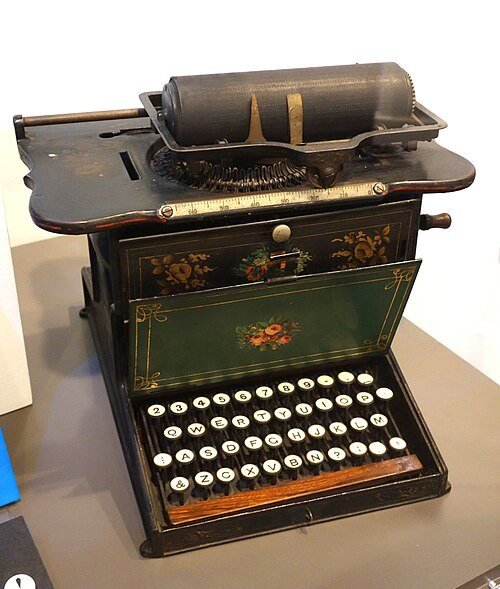Remington No. 1 typewriter with round keys, carriage and paper drum.
